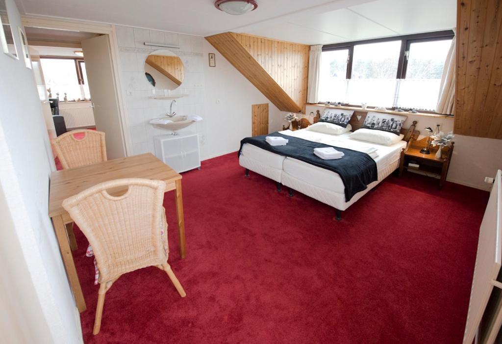 Guesthouse De Zonnestraal De Koog  Quarto foto